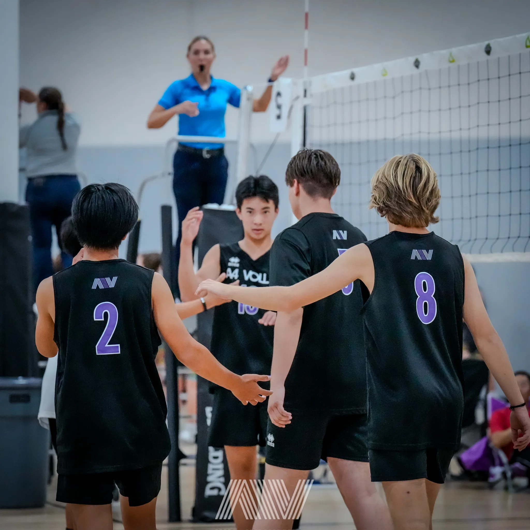 A4 Volleyball athletes on court